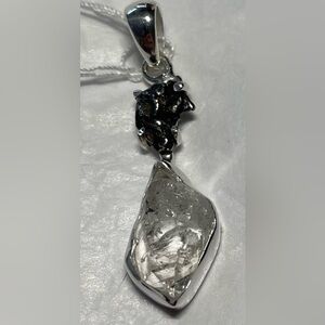 Herkimer diamond with meteorite pendant